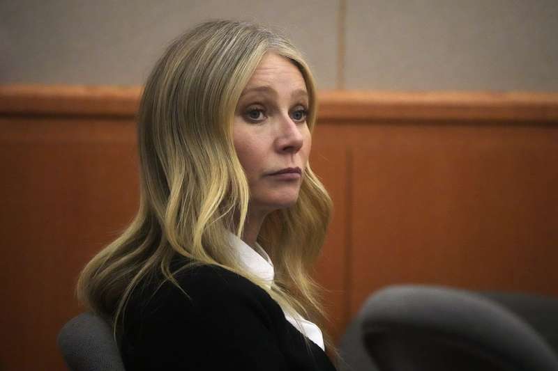 Actress Gwyneth Paltrow siting in a courtroom.
